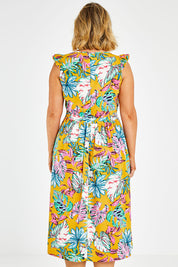 Model Jess wearing size 14 of the V Neck Gathered Sleeve Dress in colour Garden, from the back