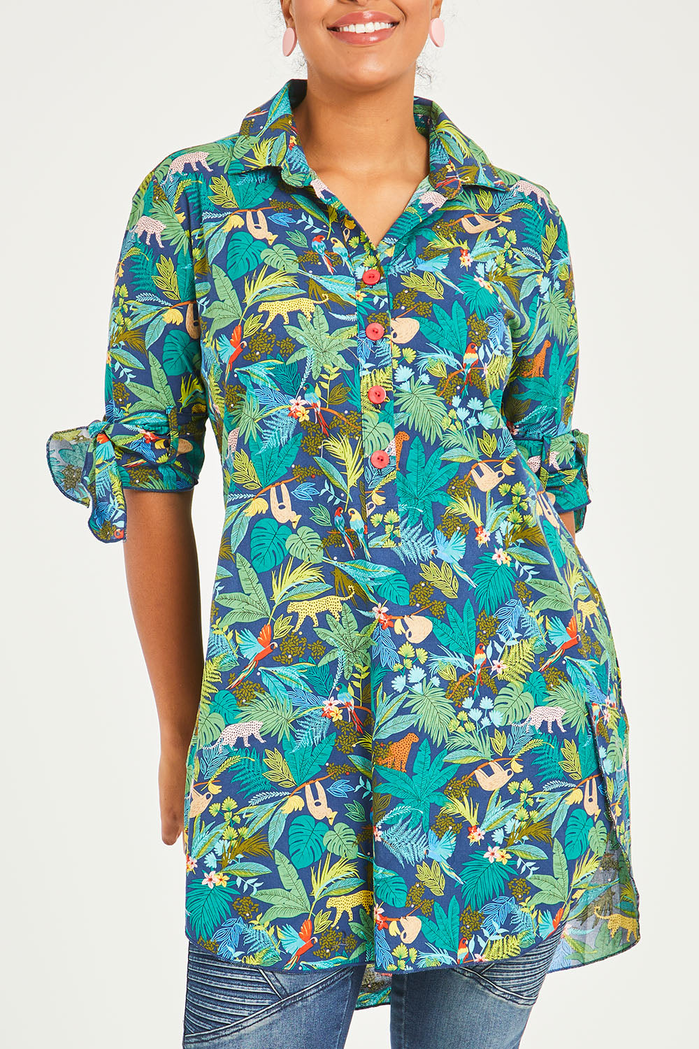 Model Noli wearing size 14 of the Printed Tunic in colour Jungle (Blue), from the front, cropped image