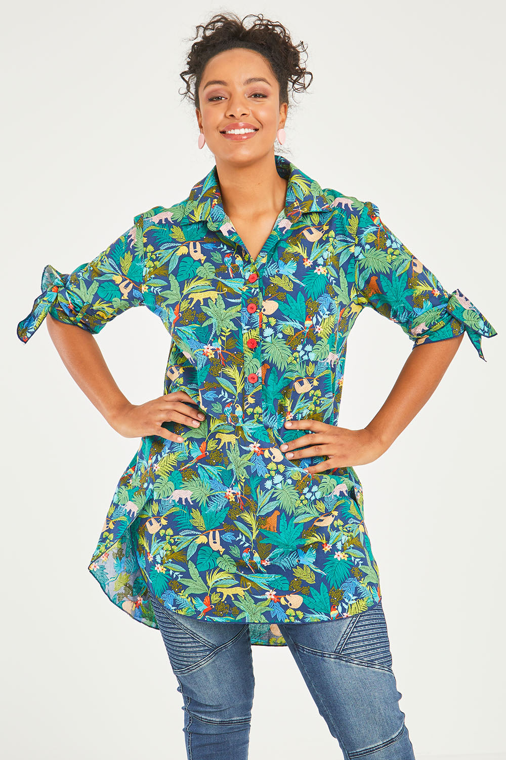 Model Noli wearing size 14 of the Printed Tunic in colour Jungle (Blue), from the front, cropped image