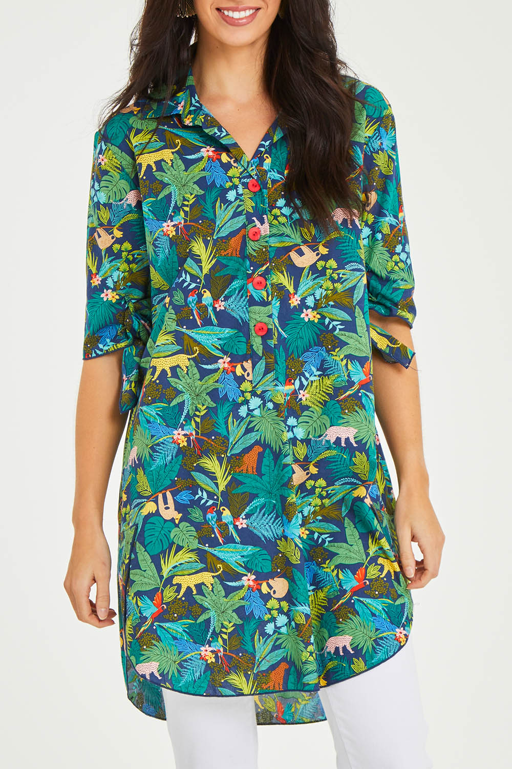 Model Stacey wearing size 10 of the Printed Tunic in colour Jungle (Blue), from the front, cropped image