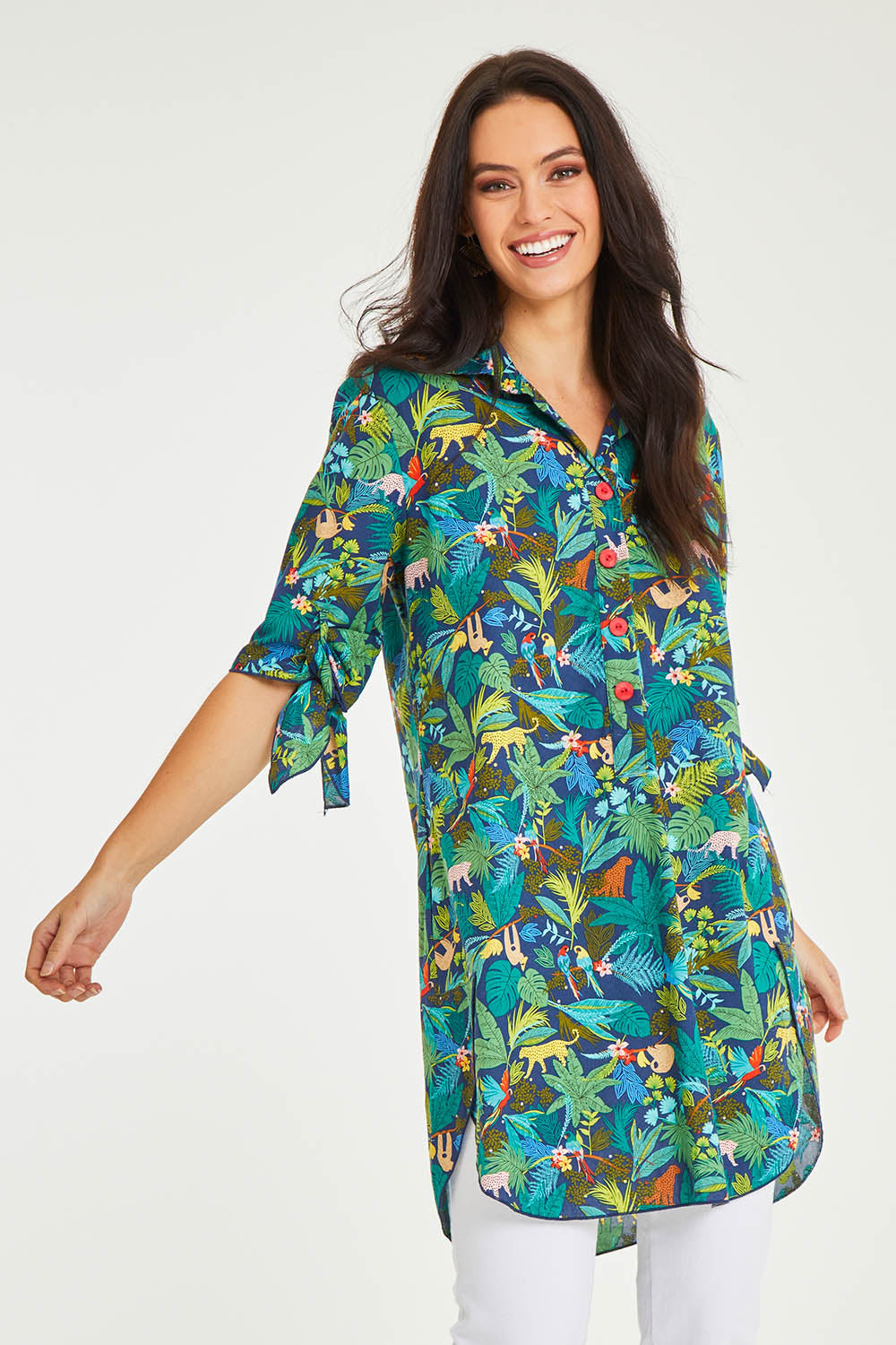 Model Stacey wearing size 10 of the Printed Tunic in colour Jungle (Blue), from the front, cropped image