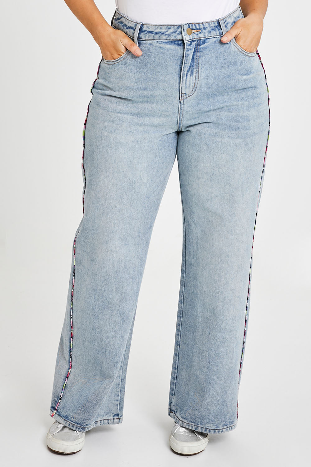 Model Laura wearing size 14 of the Patch Denim High Waisted Jeans in colour Denim (Blue), from the front, cropped image