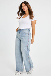 Model Laura wearing size 14 of the Patch Denim High Waisted Jeans in colour Denim (Blue), from the front, showing the whole outfit