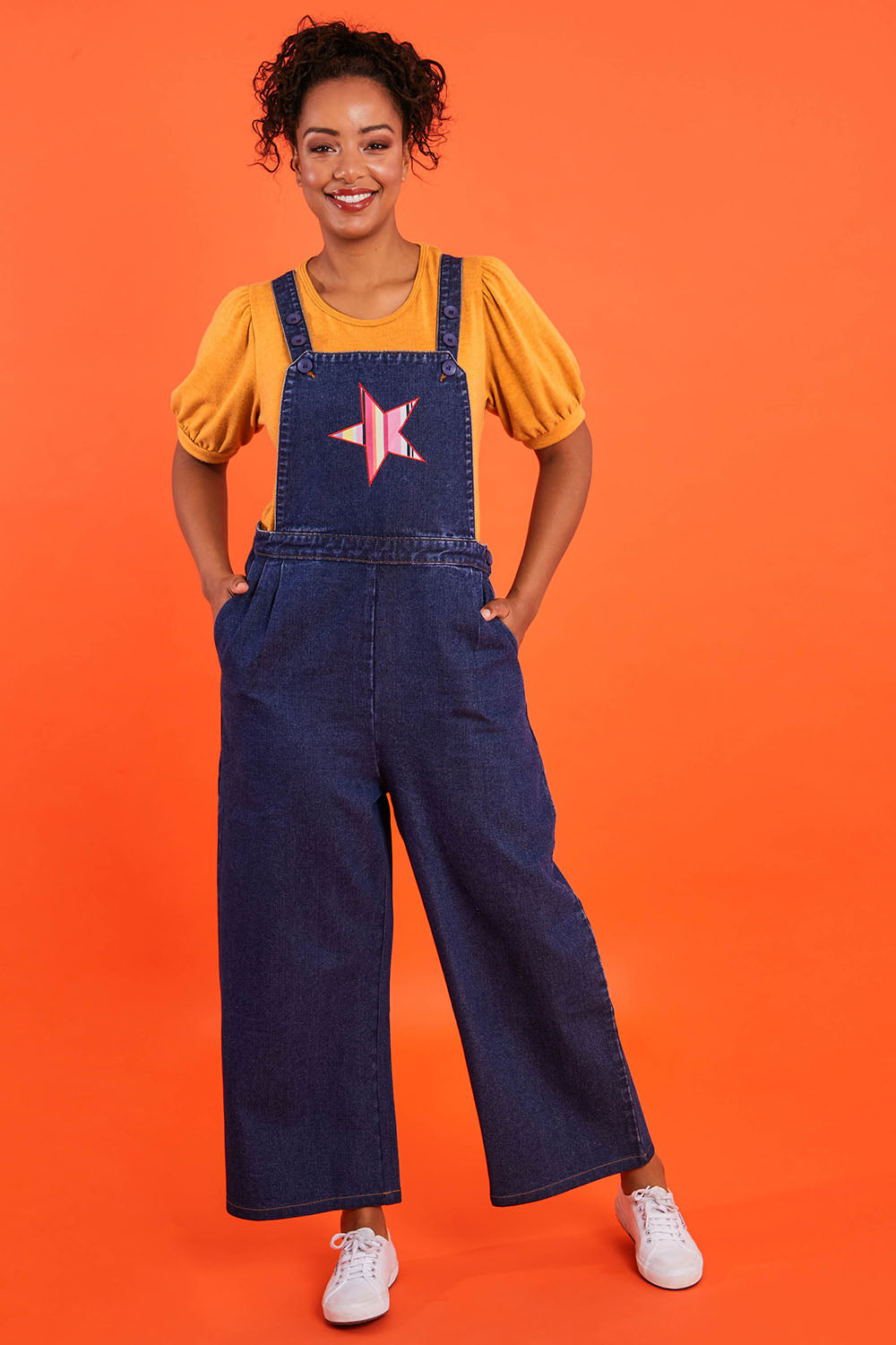 Model Noli wearing size 10 of the Star Overalls in colour Star (Blue), from the front, showing the whole outfit