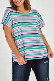 Model Monique wearing size 14 of the Striped Slouch Top in colour Striped (White), from the front, cropped image