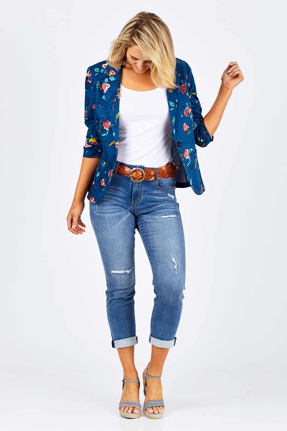 Model Emma wearing size 10 of the Printed Blazer in colour Blossom (Blue), from the front, showing the whole outfit