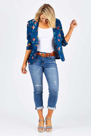 Model Emma wearing size 10 of the Printed Blazer in colour Blossom (Blue), from the front, showing the whole outfit