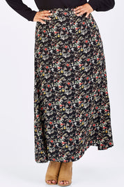 Model Shareefa wearing size 18 of the Printed Maxi Skirt in colour BlackFluer (Black), from the front, cropped image