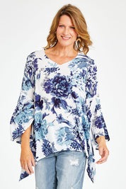 Model Naomi wearing size S of the Cuba Top in colour Blueprint (Blue), from the front, cropped image