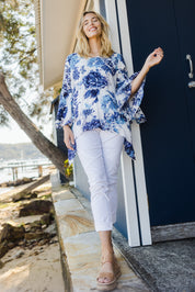 Model Phoebe wearing size S of the Cuba Top in colour Blueprint (Blue), from the front, showing the whole outfit
