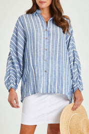 Model Madeline wearing the Cliffside Shirt in colour Nautstripe (Blue), from the front, cropped image