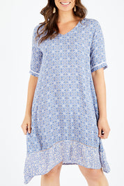 Model Shadae wearing size 10 of the Safina Dress in colour Bluedenim (Blue), from the front, cropped image