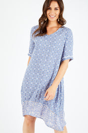 Model Shadae wearing size 10 of the Safina Dress in colour Bluedenim (Blue), from the front, cropped image