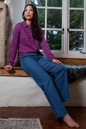 A model wearing the Oaksey Trouser in colour Blue (Blue), from the front, showing the whole outfit
