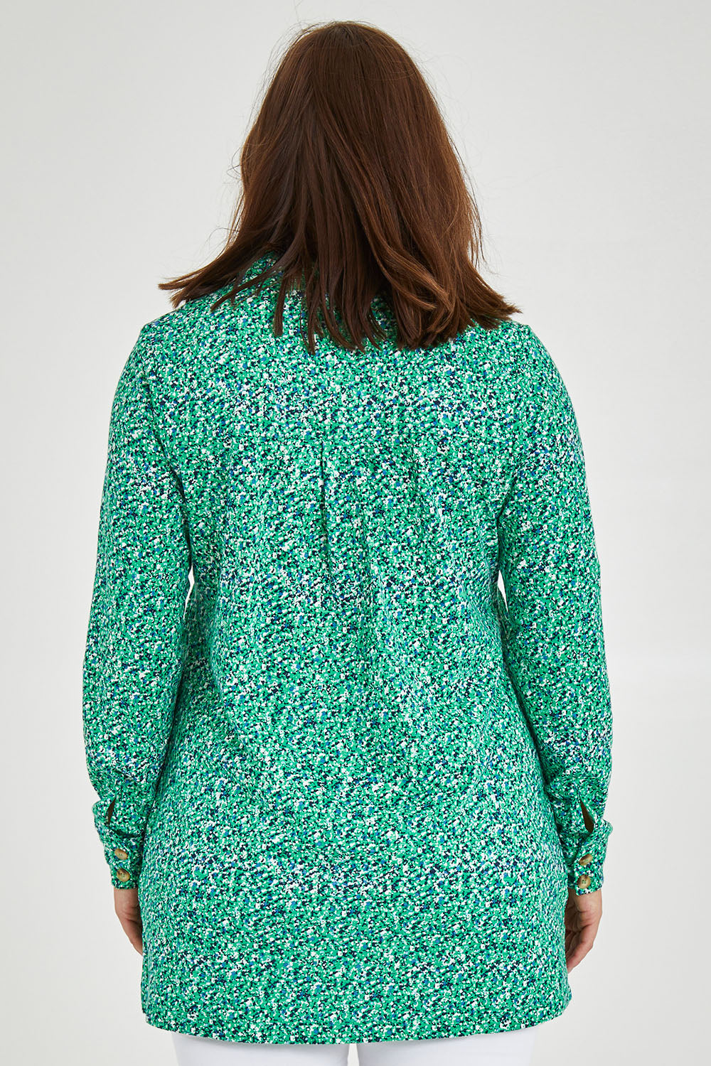 Model Monique wearing size 14 of the Grange Tunic in colour Bgreen (Green), from the back