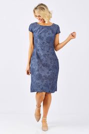 Model Emma wearing size 10 of the Victoria Dress in colour LinearFlor (Blue), from the front, showing the whole outfit