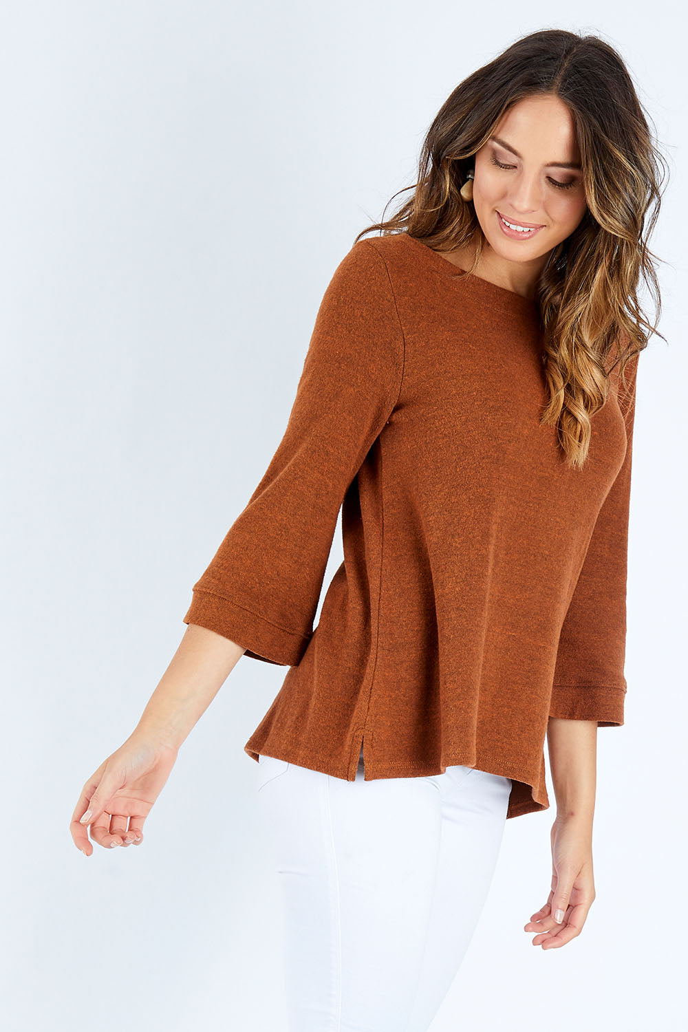 Model Madeline wearing size 10 of the Hedgrow Top in colour Ginger, from the front, cropped image