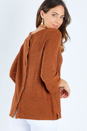 Model Madeline wearing size 10 of the Hedgrow Top in colour Ginger, from the front, cropped image