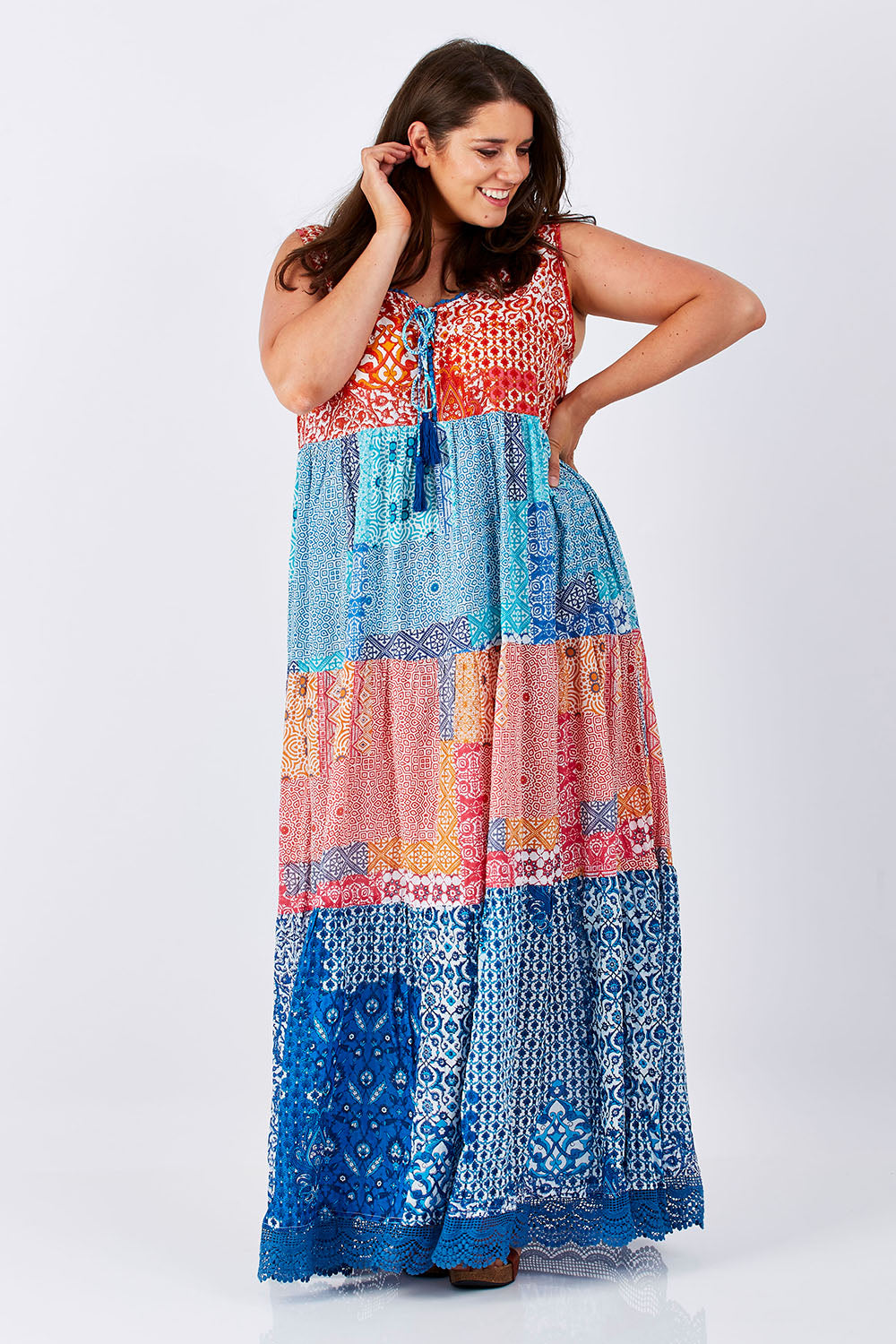 Model Mae wearing size XXL of the Galleria Panel Dress in colour Multi (Blue), from the front, showing the whole outfit