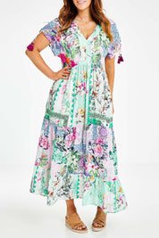 Model Laura wearing size L of the Jamie Midi in colour Multi (Pink), from the front, cropped image