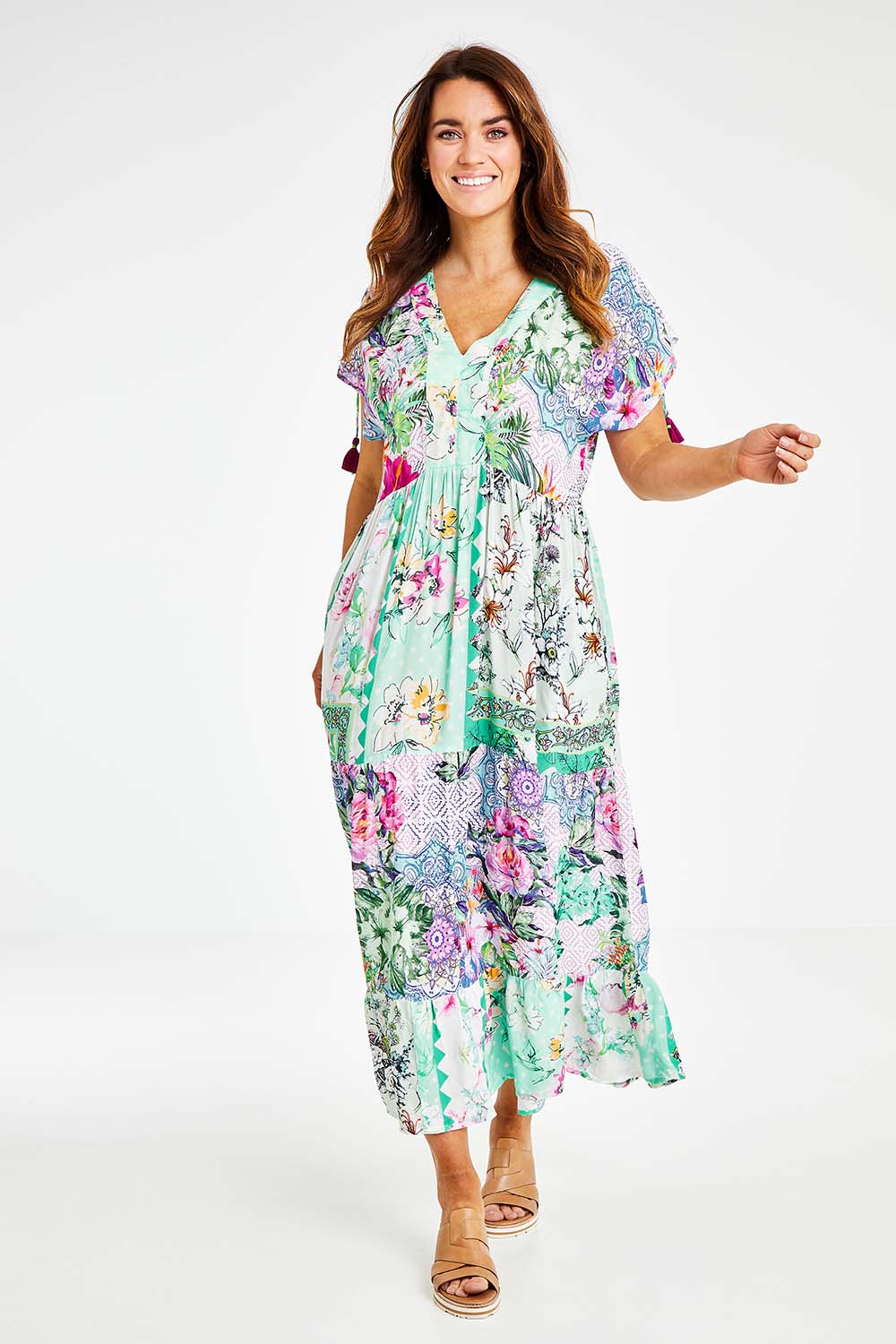 Model Laura wearing size L of the Jamie Midi in colour Multi (Pink), from the front, showing the whole outfit