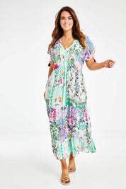 Model Laura wearing size L of the Jamie Midi in colour Multi (Pink), from the front, showing the whole outfit