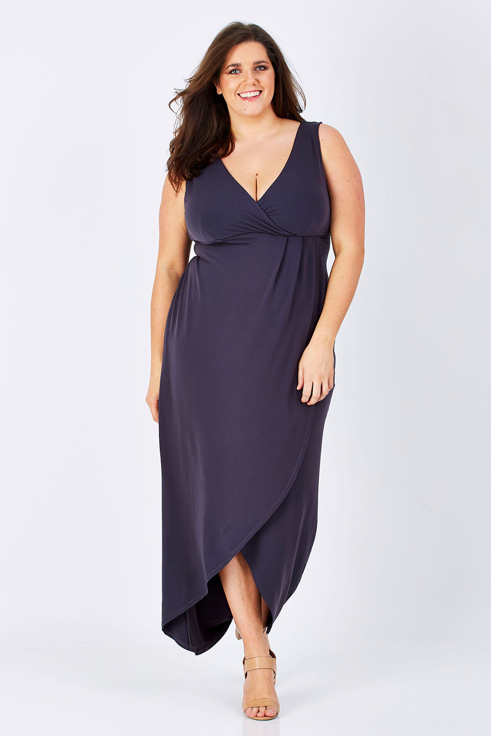 Model Mae wearing size 16 of the Phillipa in colour Thunder (Grey), from the front, showing the whole outfit