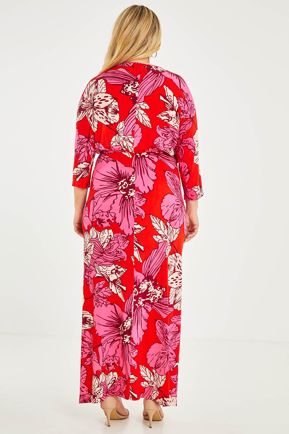 Model Katie wearing size 16 of The Printed Nadine Dress in colour Hibiscus (Red), from the back