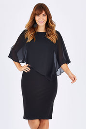 Model Laura wearing size 12 of the Cassi in colour Black (Black), from the front, cropped image