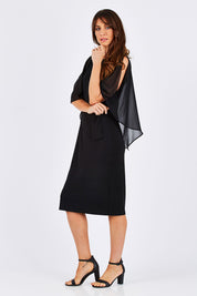 Model Monique wearing size 10 of the Cassi in colour Black (Black), from the front, showing the whole outfit