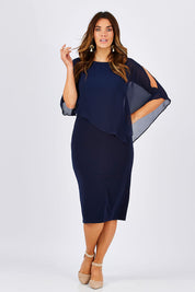 Model Laura wearing size 12 of the Cassandra Dress in colour Navy (Blue), from the front, showing the whole outfit