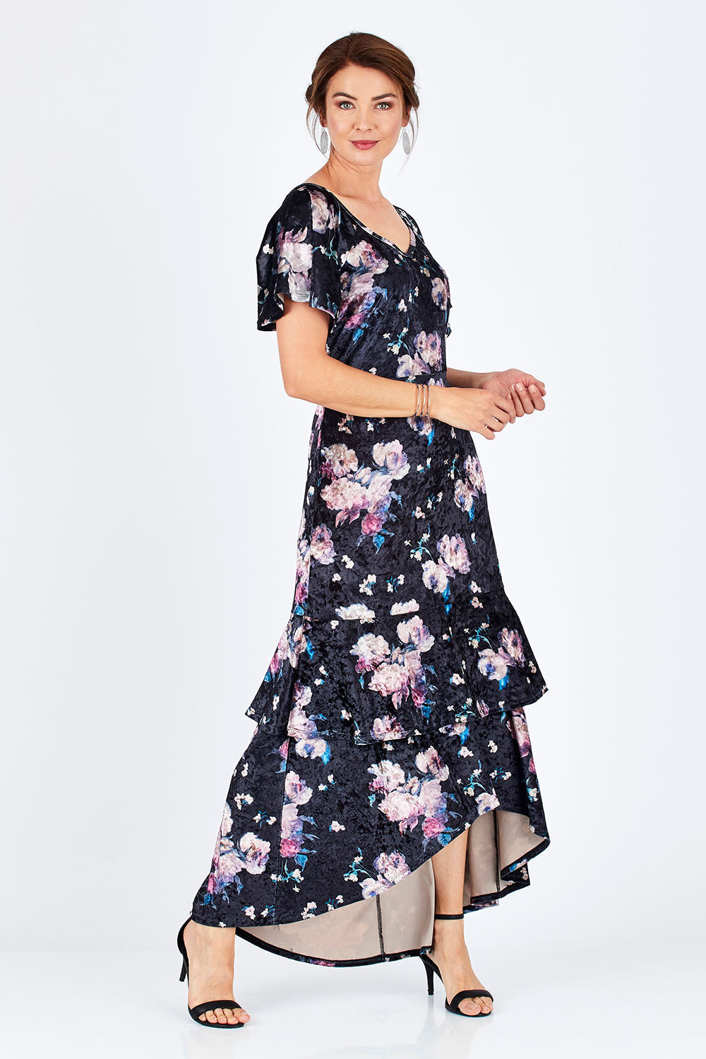 Model Rebecca wearing size 10 of the Rebecca Dress in colour WinterRose (Black), from the front, showing the whole outfit