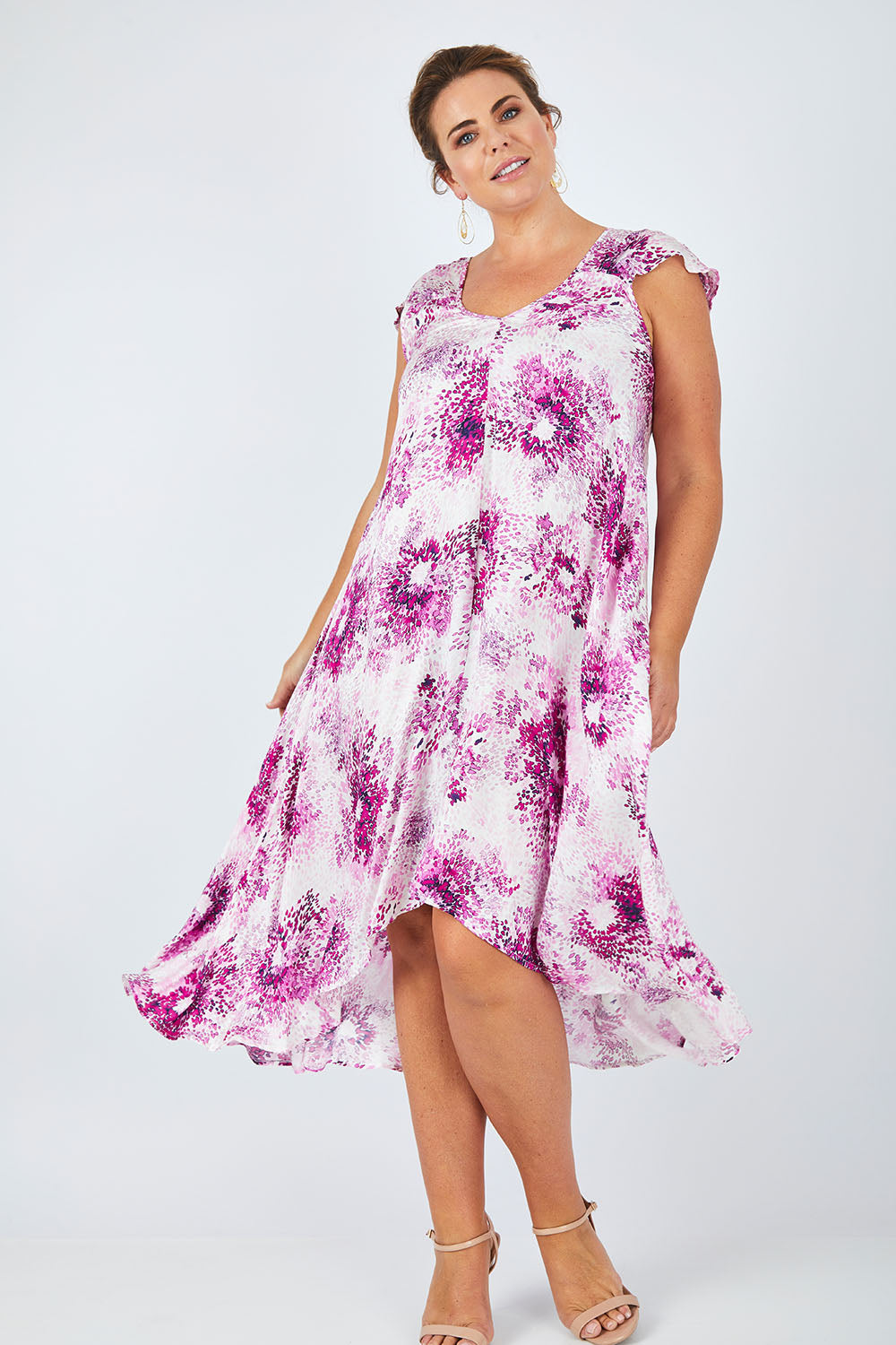 Model Fiona wearing size 16 of the Prue Dress in colour Jacaranda (Pink), from the front, showing the whole outfit