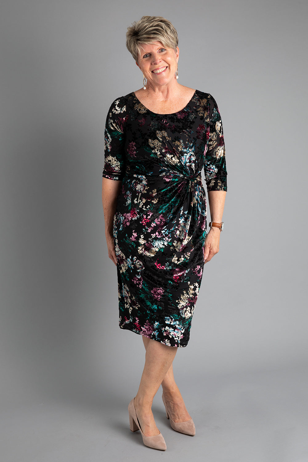 A model wearing size 8 of the Janelle Dress in colour Moonstone (Black), from the front, showing the whole outfit