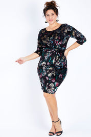 Model Jess wearing size 16 of the Janelle Dress in colour Moonstone (Black), from the front, showing the whole outfit