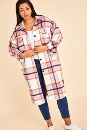 Model Terri-Leigh wearing size OneSize of the Aberdeen Jacket in colour Musk (Pink), from the front, showing the whole outfit