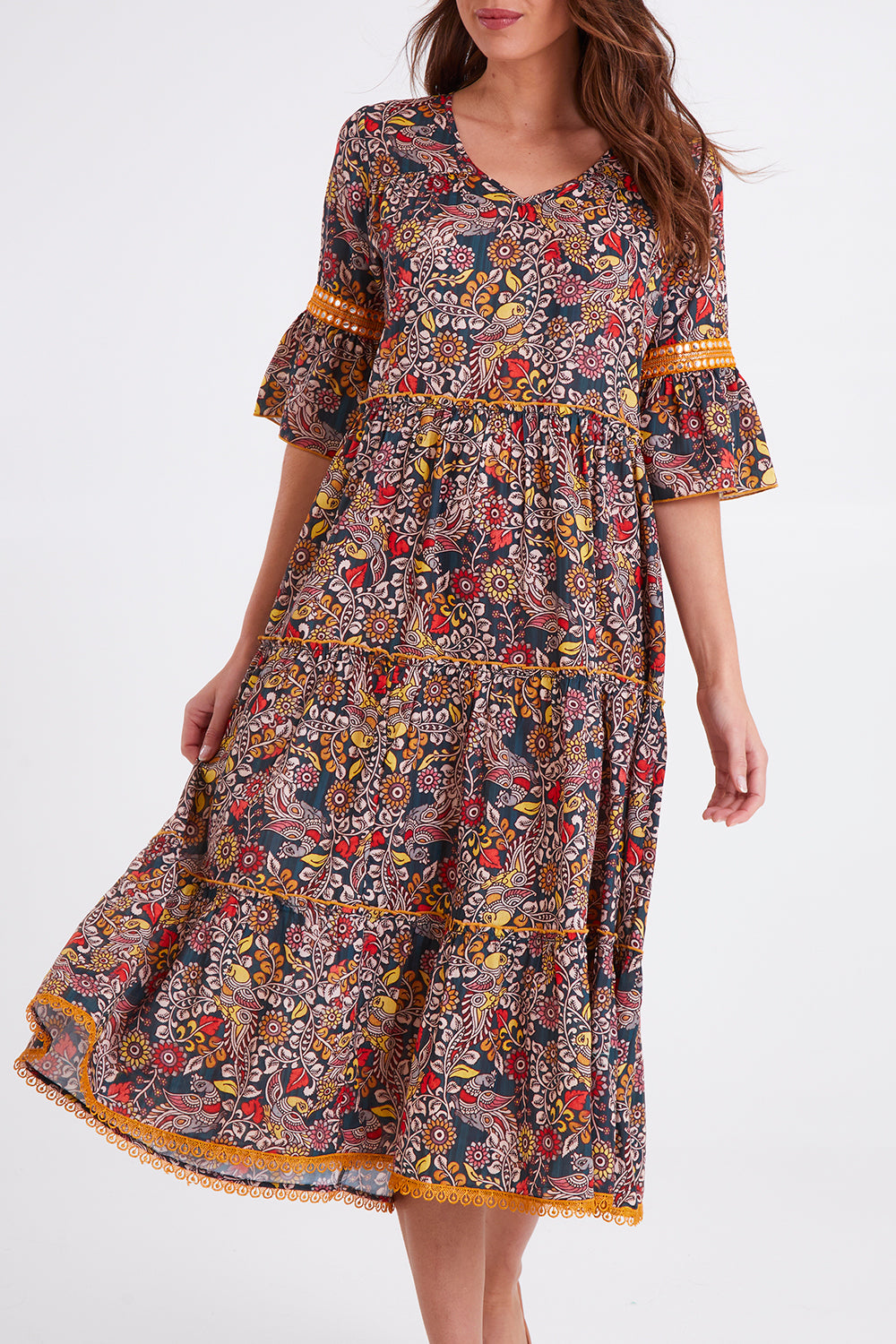 Model Madeline wearing size S of the Avlon Midi in colour Beatrix (Black), from the front, cropped image