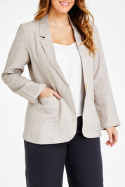 Model Laura wearing size 14 of the Cotton Linen Longline Blazer in colour Desertsand, from the front, cropped image
