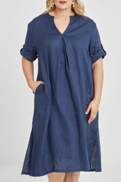 Model Keeara wearing size 16 of the Linen Summer Relaxed Dress in colour Blue (Blue), from the front, cropped image