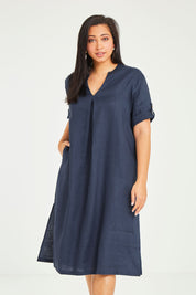 Model Noli wearing size 14 of the Preloved Linen Summer Relaxed Dress in colour Blue (Blue), from the front, cropped image