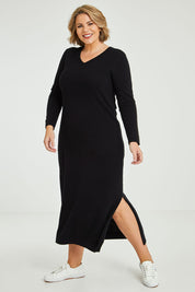 Model Fiona wearing size XL of the Cotton Cashmere Wool V Neck Knit Dress in colour Black (Black), from the front, showing the whole outfit