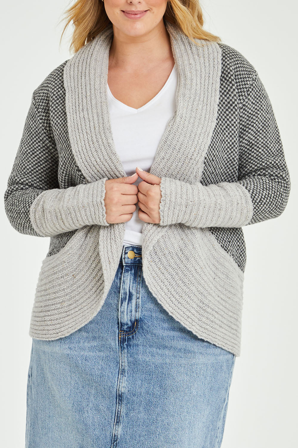 Model Jess wearing size L of the Wool Cocoon Cardigan in colour Grey (Grey), from the front, cropped image