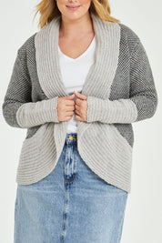 Model Jess wearing size L of the Wool Cocoon Cardigan in colour Grey (Grey), from the front, cropped image