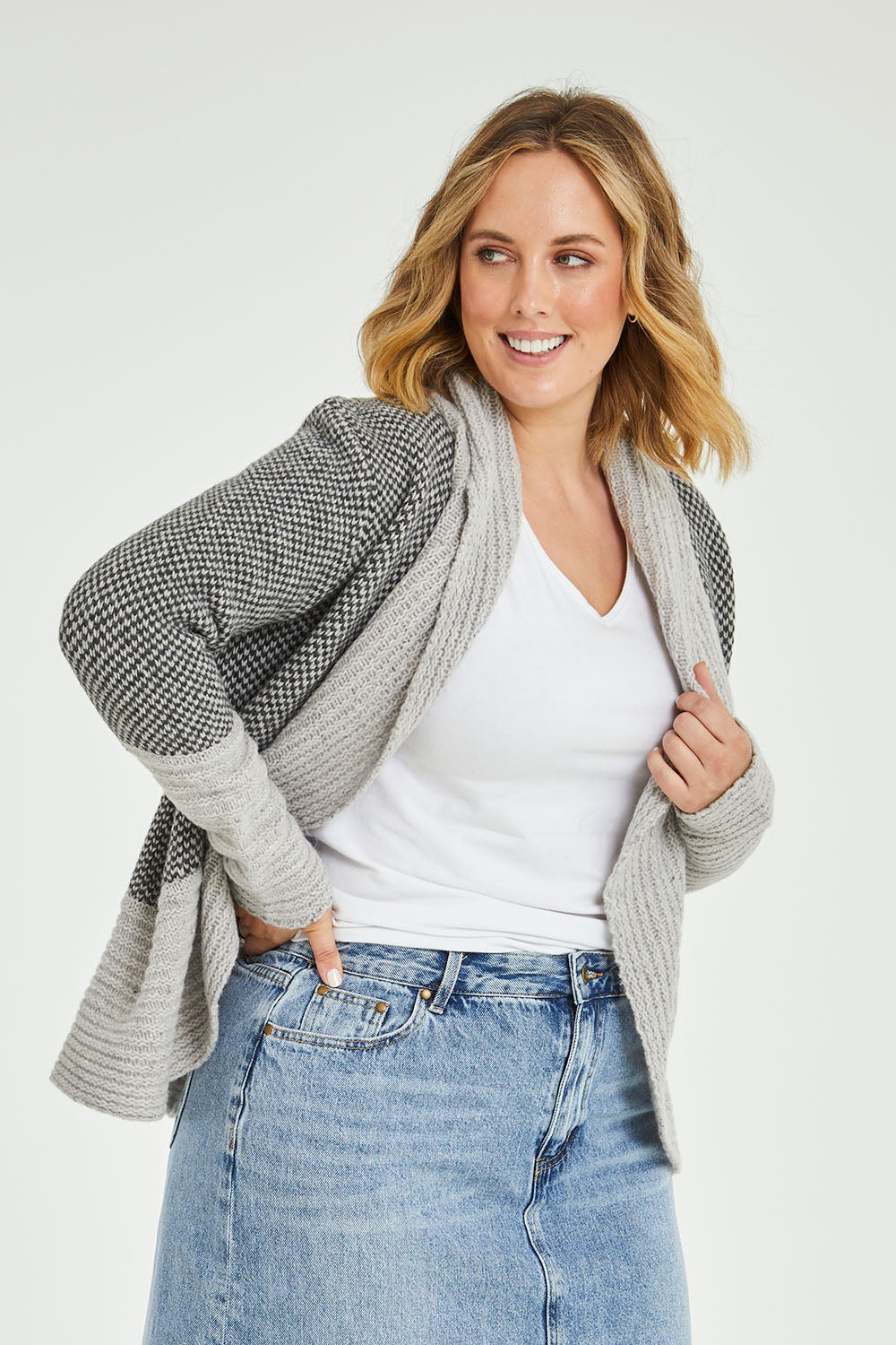 Model Jess wearing size L of the Wool Cocoon Cardigan in colour Grey (Grey), from the front, cropped image