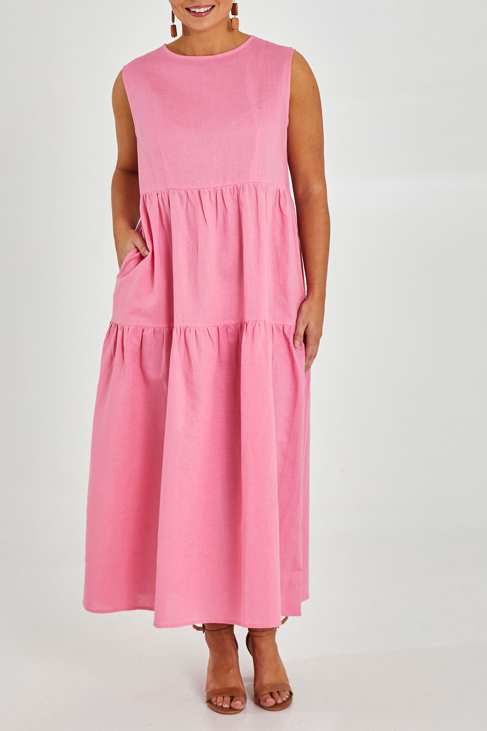 Model Monique wearing size 14 of the Linen Cotton Sleeveless Maxi Dress in colour Pink (Pink), from the front, cropped image