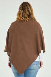 Model Jess wearing size L of the Cotton Cashmere Wool Poncho in colour Richearth, from the back