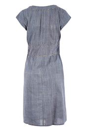 Product shot of the Daisy Dress Eventide in colour Eventide (Grey), from the back