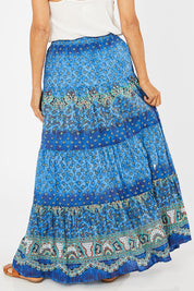Model Rachel wearing size 10 of the Maxime Organic Cotton Crinkle Skirt in colour Print (Blue), from the back