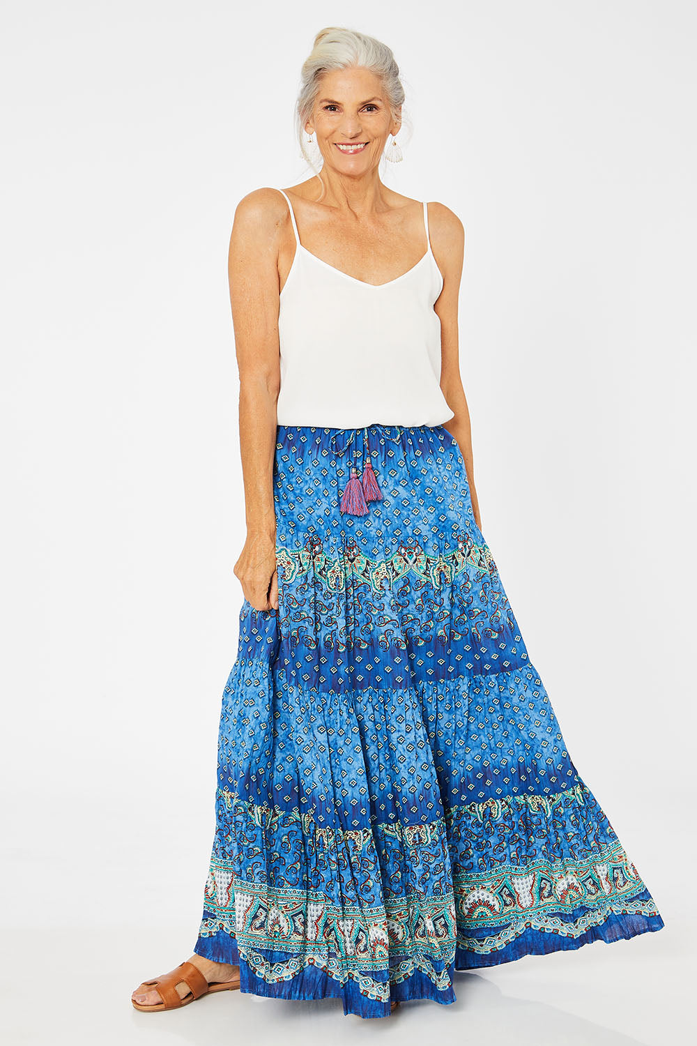 Model Rachel wearing size 10 of the Maxime Organic Cotton Crinkle Skirt in colour Print (Blue), from the front, showing the whole outfit