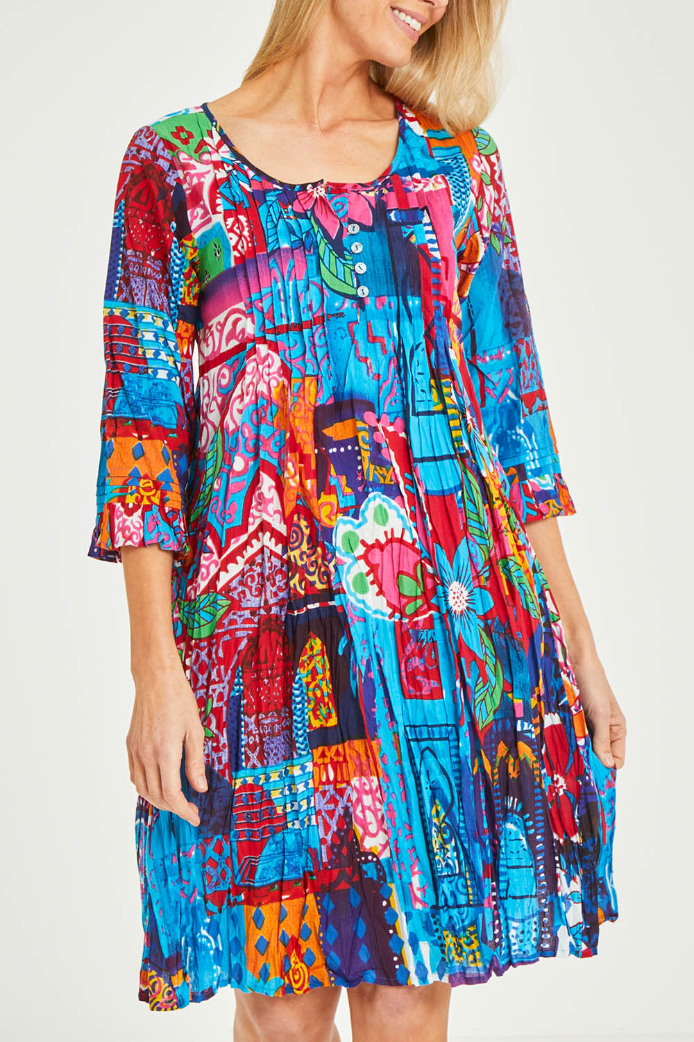Model Kelly wearing size 10 of the Organic Cotton 3/4 Sleeve Dress in colour Marared (Blue), from the front, cropped image